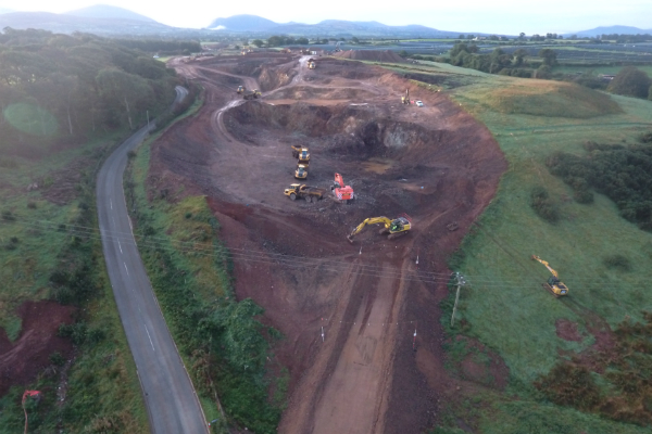 Photo from above of digging machines excavating the earth shaping the A487 bypass.