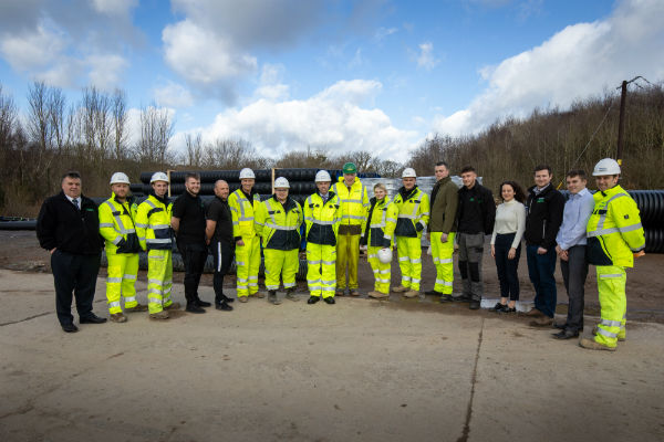 Ken Skates, Minister for North Wales with contractors and apprentices at the A487 bypass development.