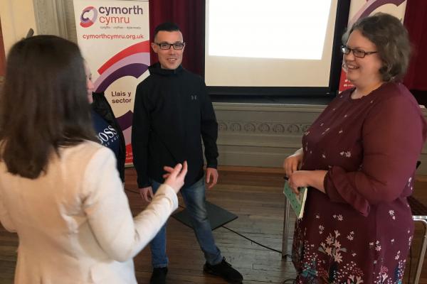 A member of the Commission on Justice in Wales, Dr Nerys Llewelyn Jones with director of Cymorth Cymru, Katie Dalton at the event in Rhyl Town Hall. 