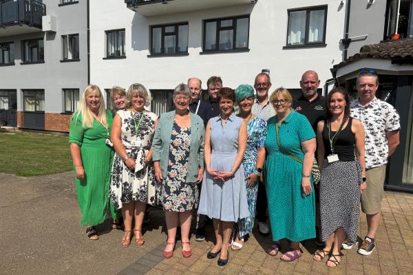 Cabinet Secretary for Social Justice, Jane Hutt, with Older People’s Commissioner for Wales, and staff and volunteers at Monmouthshire Housing Association