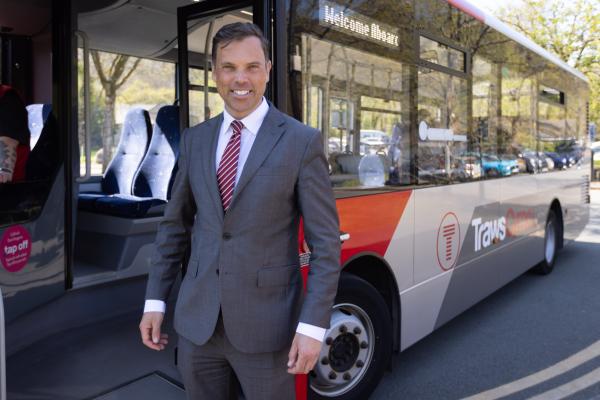 Ken Skates MS with a bus 