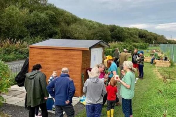 Local residents and volunteers gathered at the new community garden in Talysarn, Gwynedd.